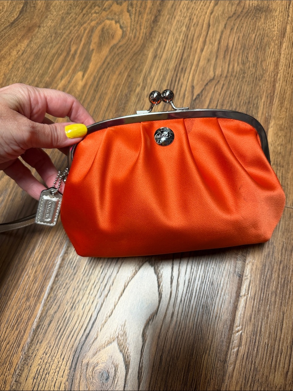 Coach Bright Orange Satin Kiss-Lock Wristlet Clutch
